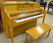 Charles R Walter oak console piano